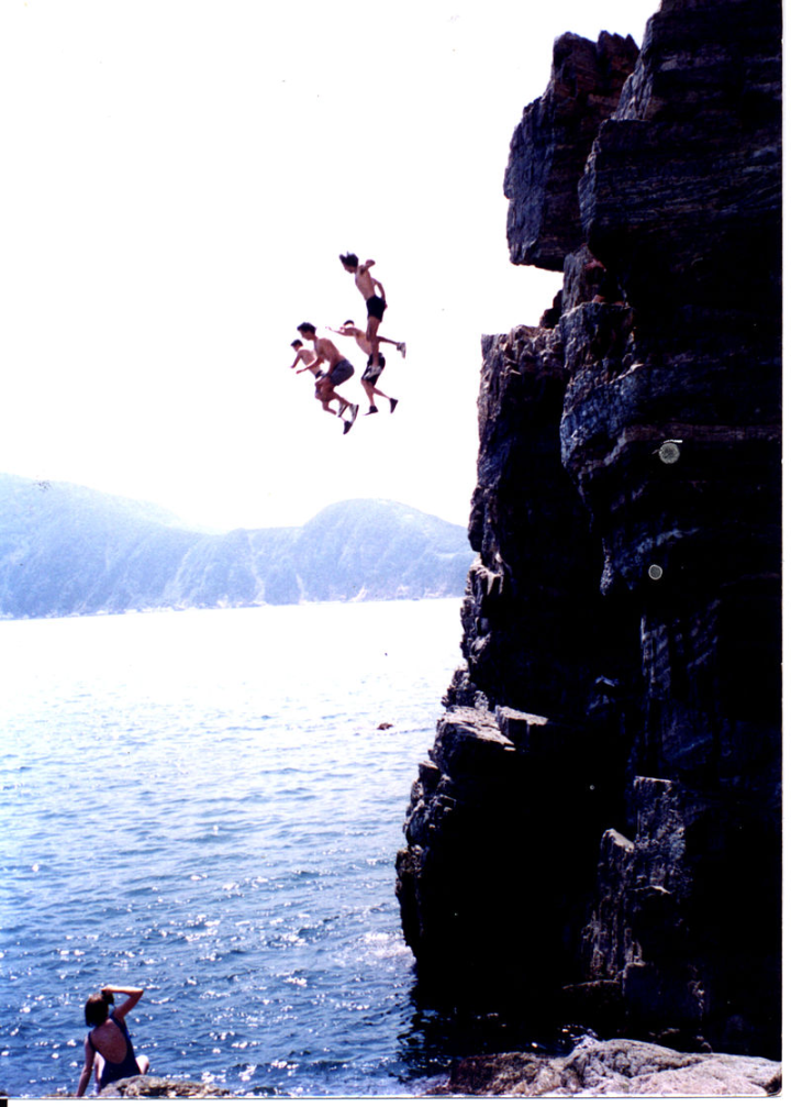 boys cliff jumping huge cliff